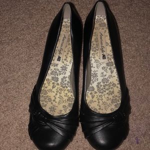 Black flats with small wedge